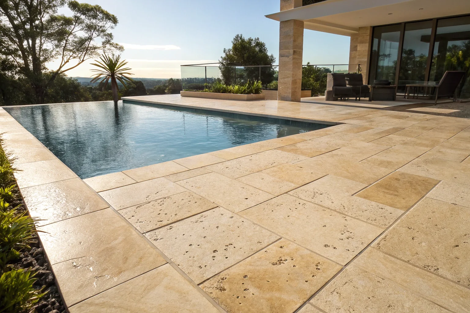 Freshly sealed travertine pool surround at an Australian residential property